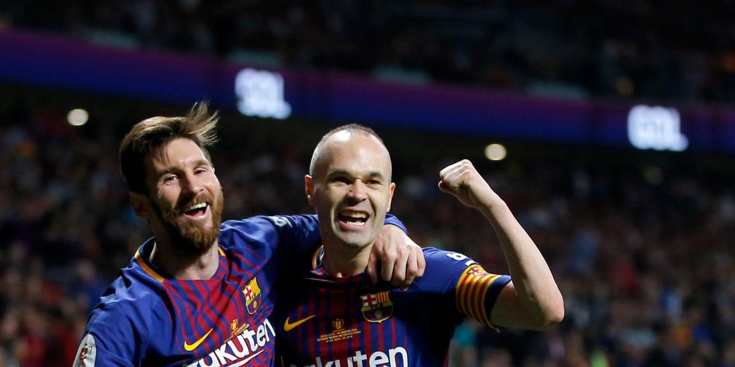 Lionel Messi och Andrés Iniesta jublar efter ett av Barcelonas mål.