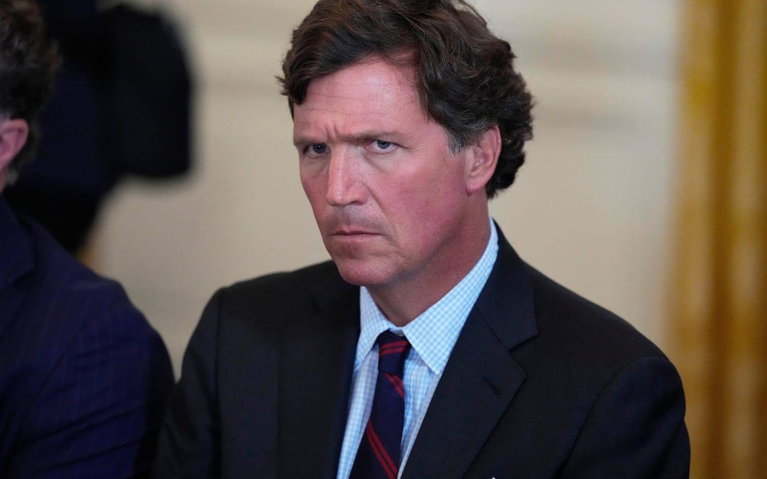 Podcastvärden och tidigare Fox News-programledaren Tucker Carlson, fotograferad i Vita huset i januari.