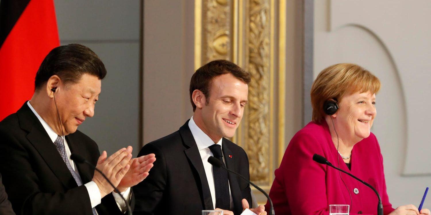 Kinas president Xi Jinping, Frankrikes president Emmanuel Macron och Tysklands förbundskansler Angela Merkel.