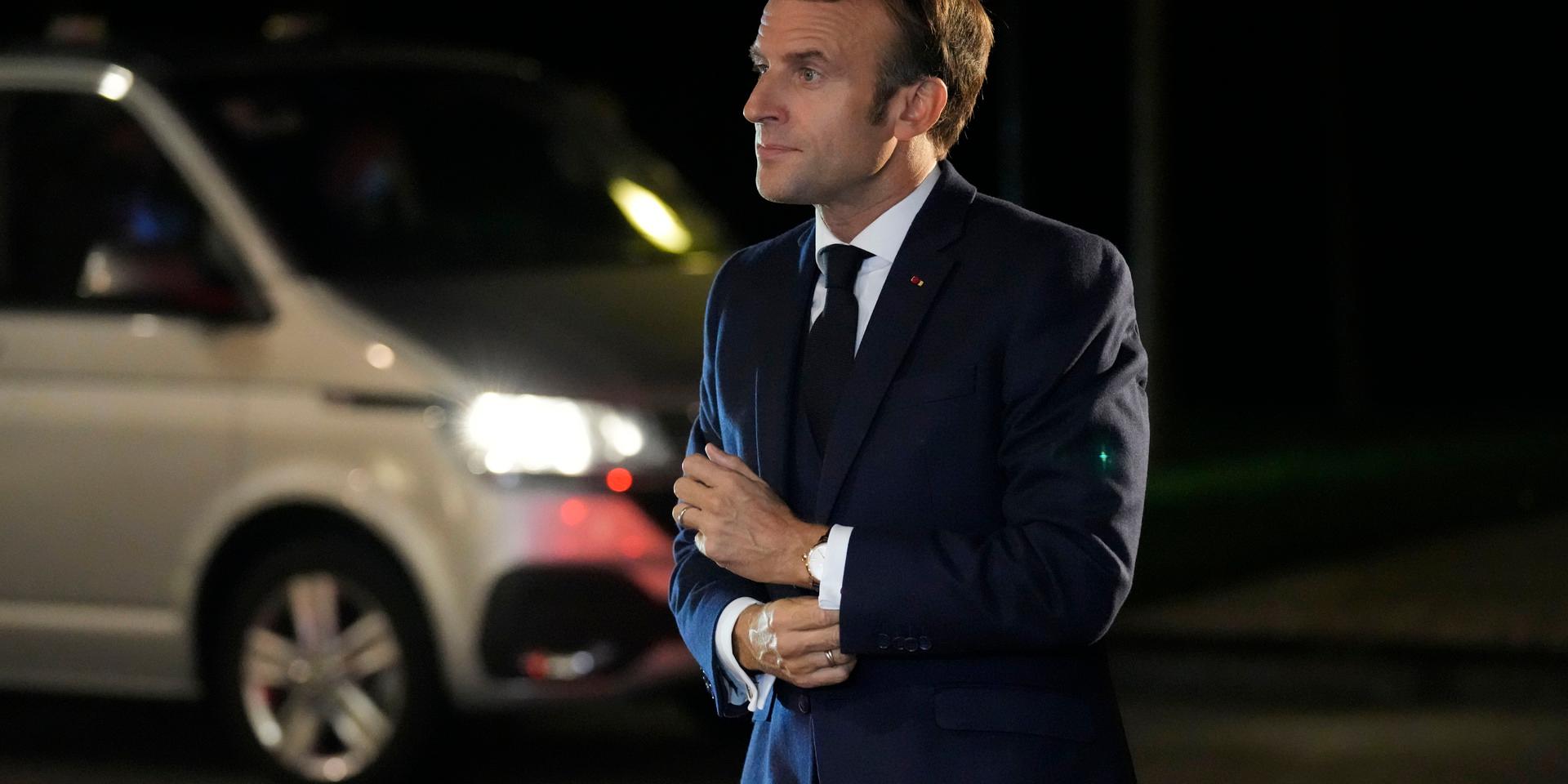 French President Emmanuel Macron arrives for a dinner event at an EU summit, at the Brdo Castle in Kranj, Slovenia, Tuesday, Oct. 5, 2021. EU leaders are meeting Tuesday evening to discuss increasingly tense relations with China and the security implications of the chaotic U.S.-led exit from Afghanistan, before taking part in a summit with Balkans leaders on Wednesday. (AP Photo/Darko Bandic)  VLM168