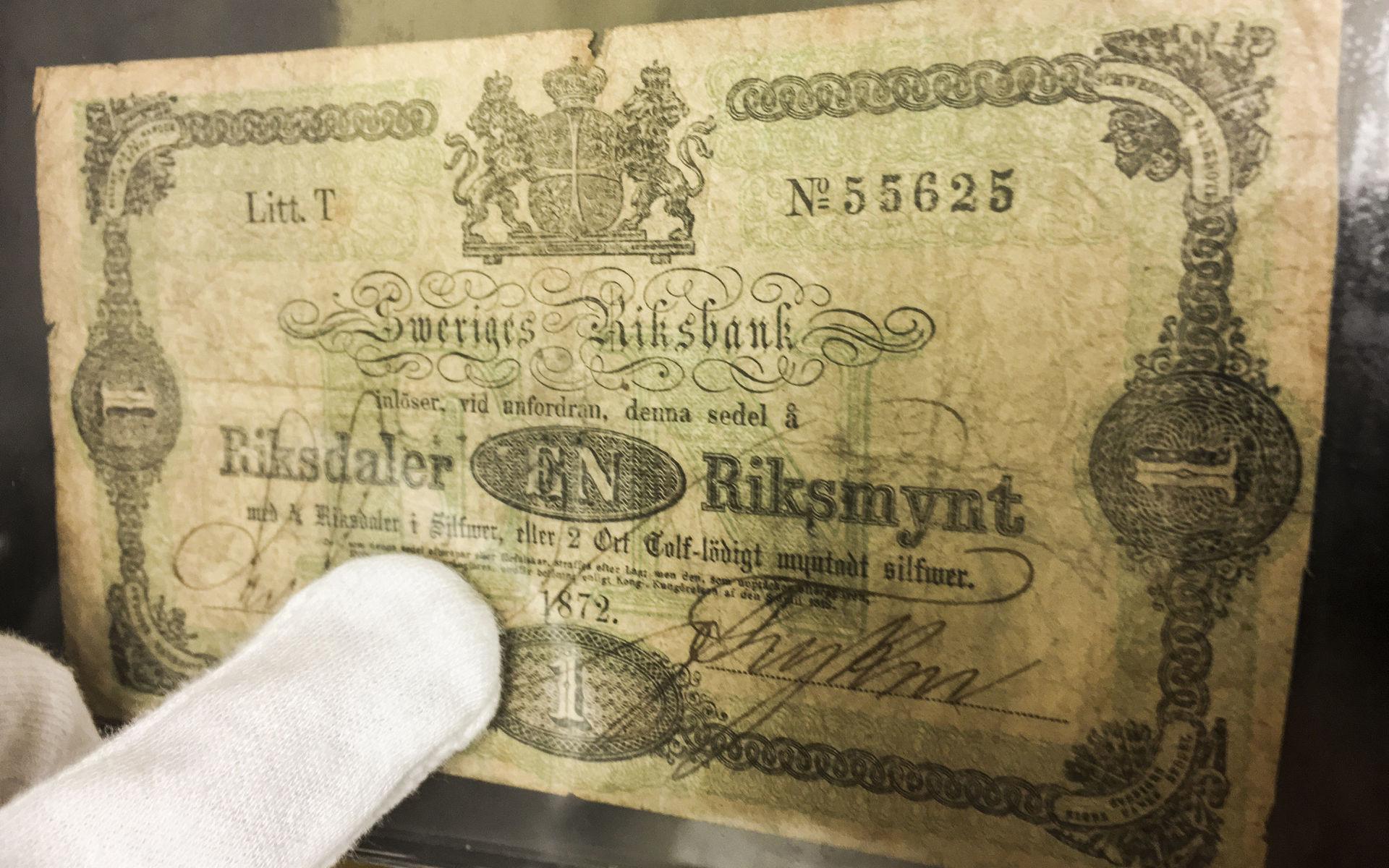 En riksdaler från ”Sweriges Riksbank” från 1872.