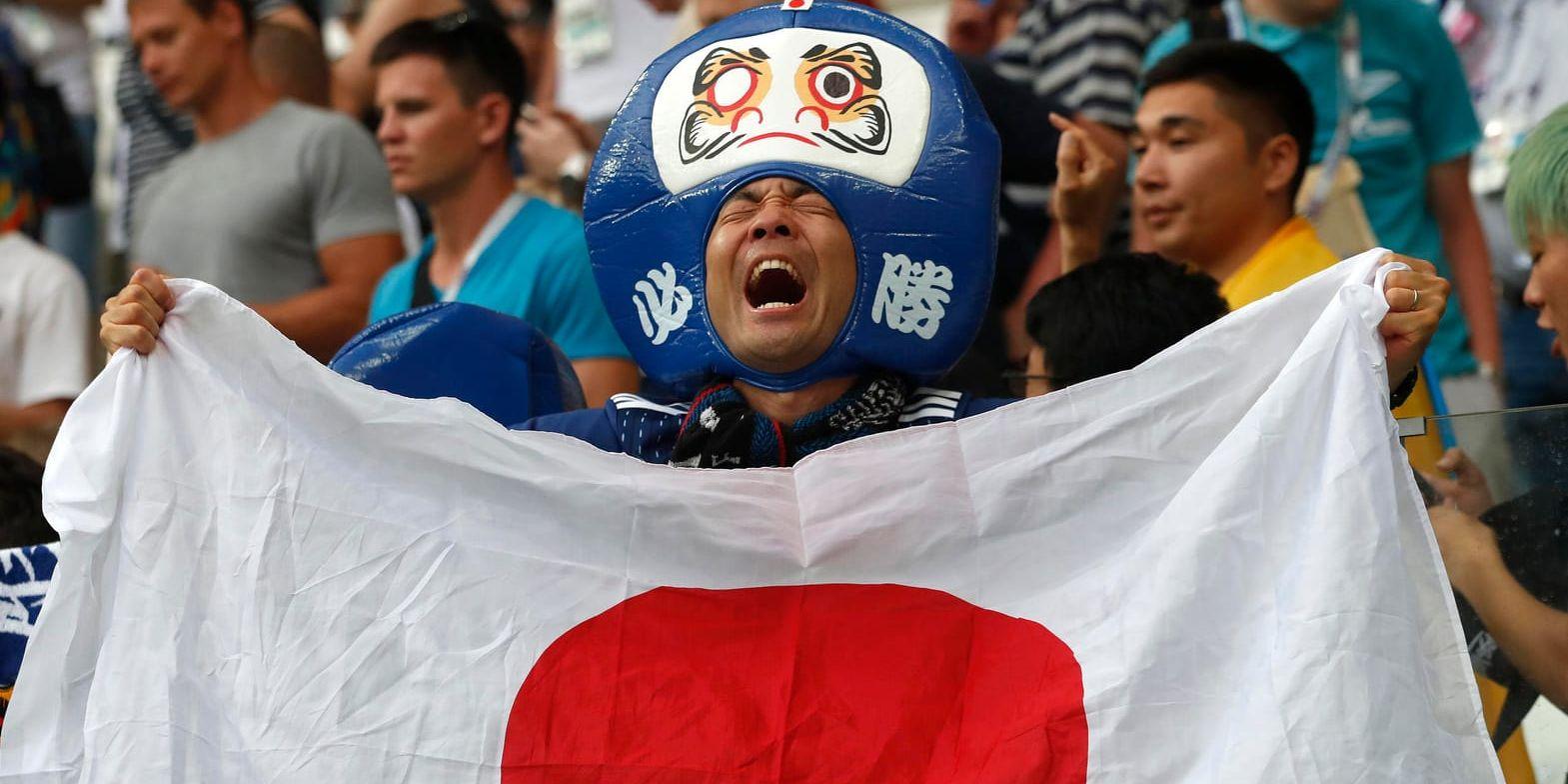 Japansk glädje efter förlustmatchen mot Polen, som ändå innebar avancemang.