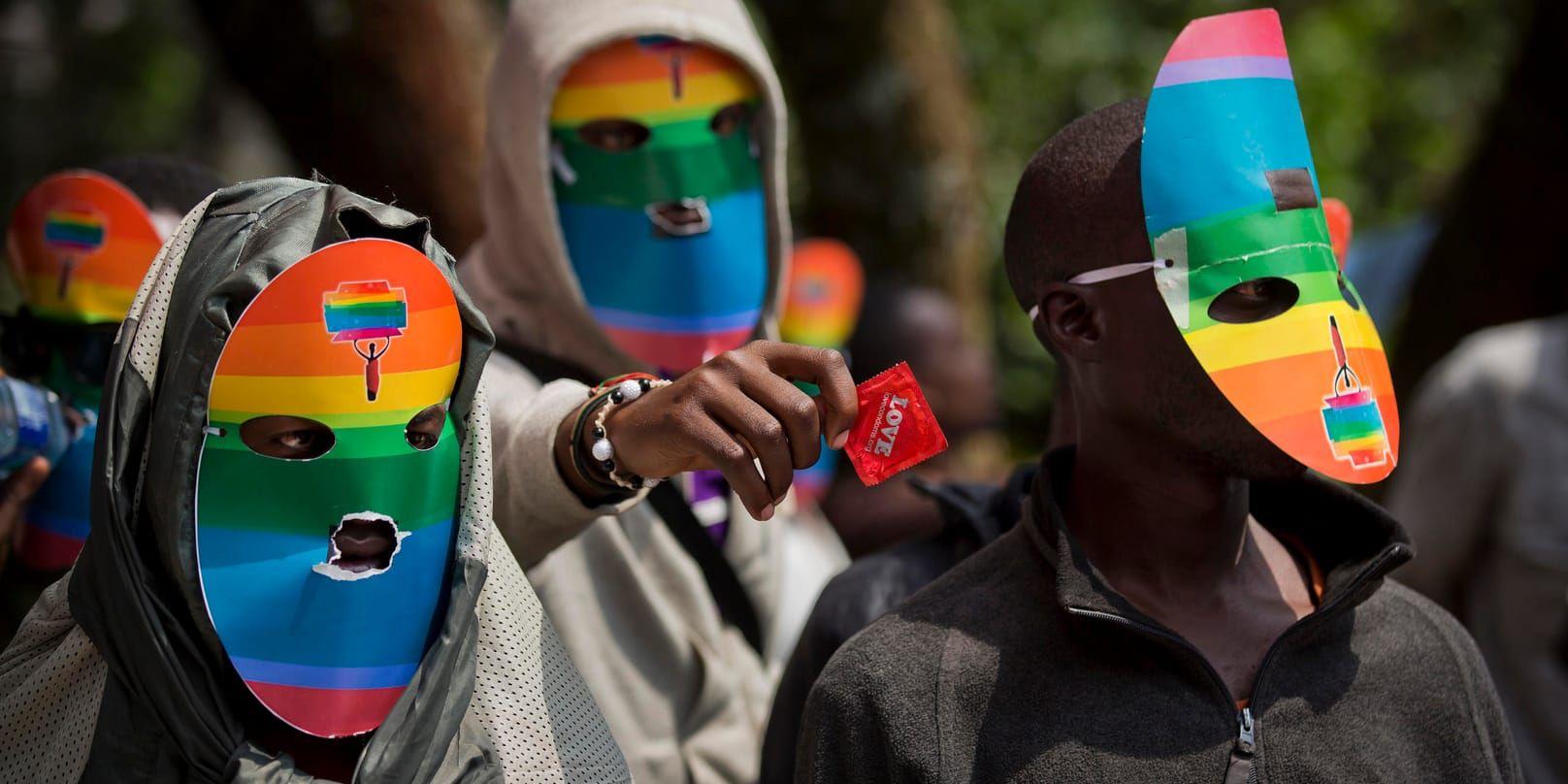 Kenyanska aktivister protesterar mot de lagar som kriminaliserar homosexualitet. Arkivbild.