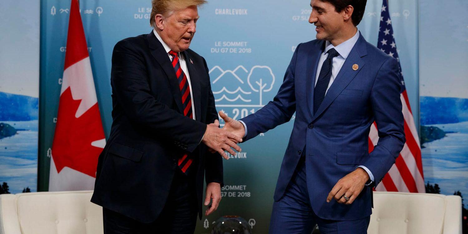 Inte så såta vänner längre. USA:s president Donald Trump skakar hand med Kanadas premiärminister Justin Trudeau under G7-toppmötet i Kanada.